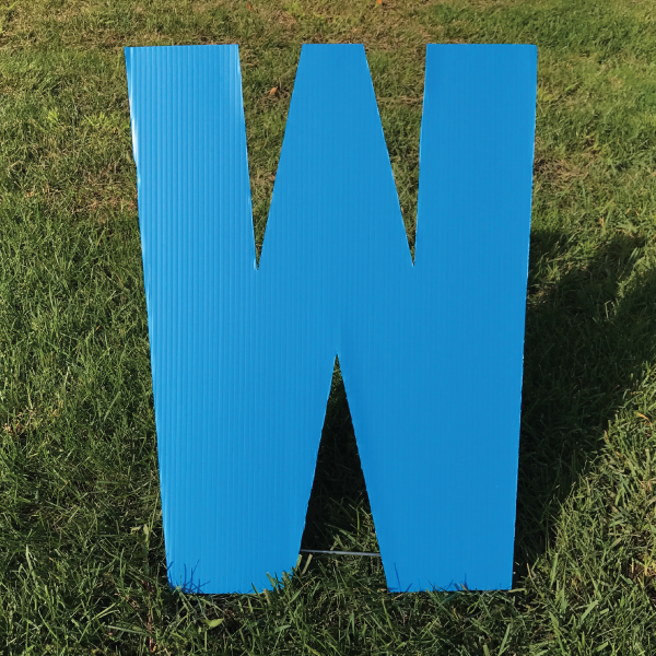 letter-w-blue-yard-greeting-card-sign-happy-birthday-over-the-hill-plastic