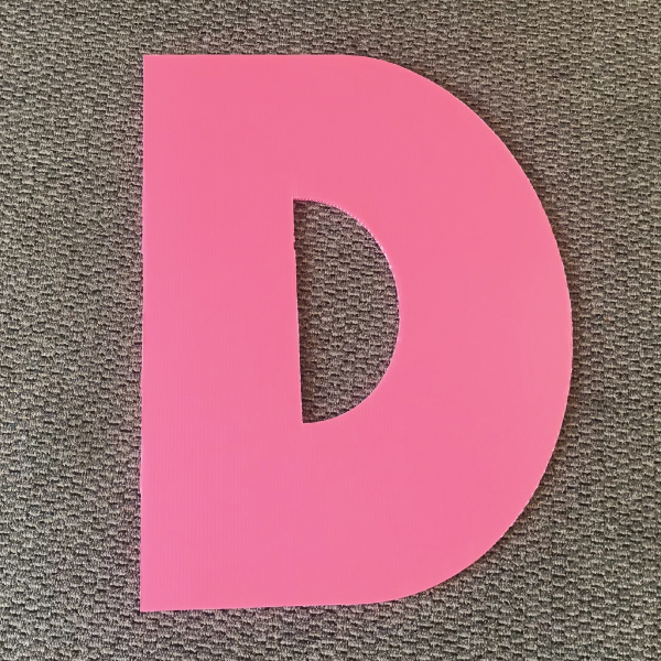 letter-d-pink-yard-greetings-cards-lawn-signs-happy-birthday-over-hill